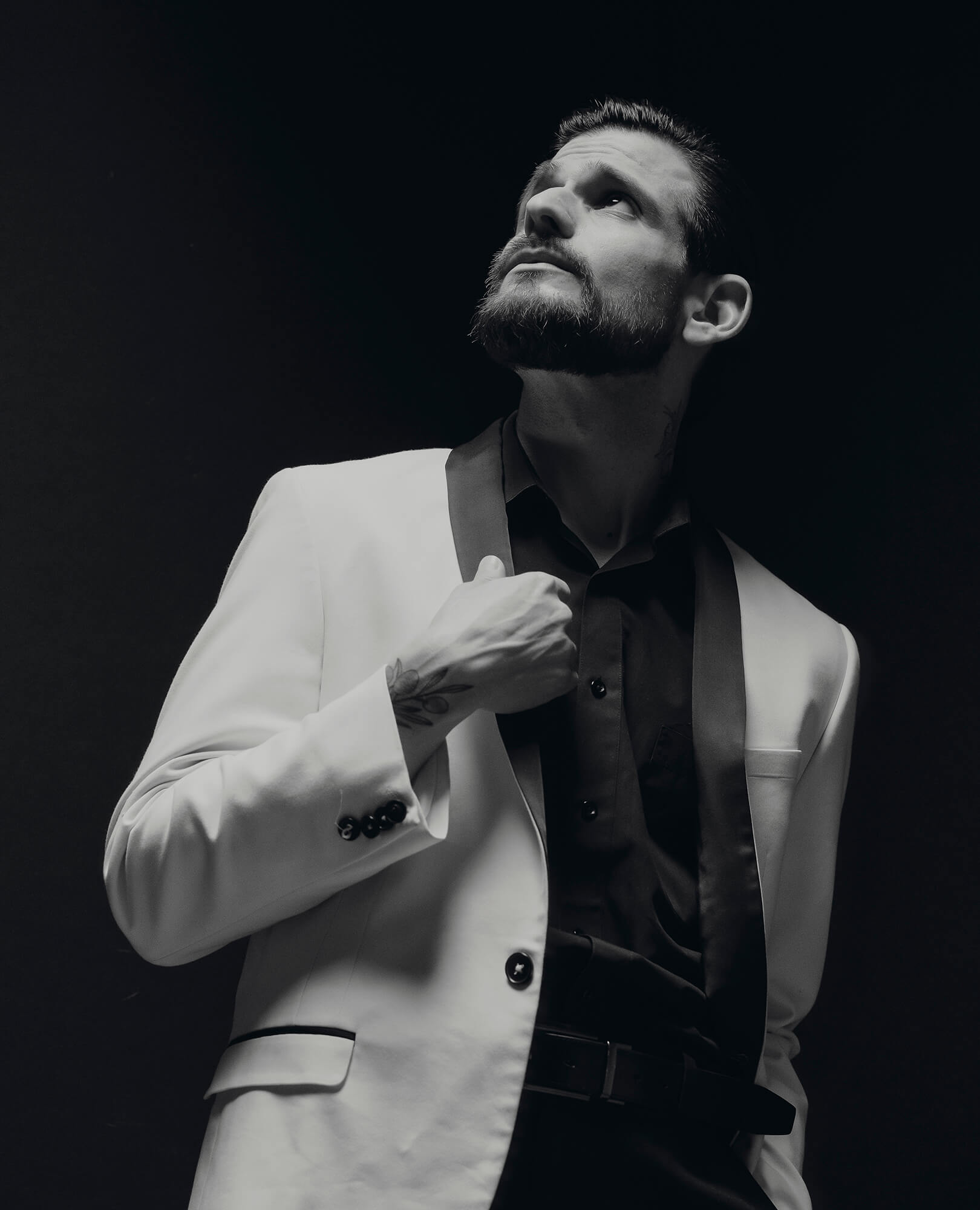 Richard Cortez in white tuxedo